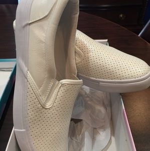 NEW white leather slip on tennis shoes.